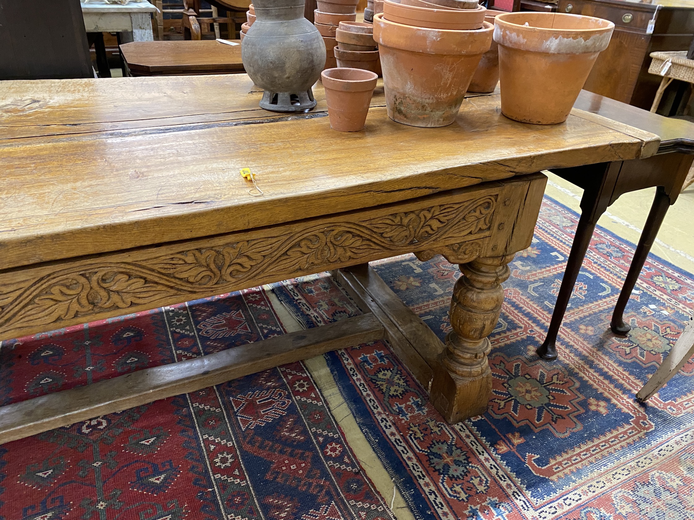 A 17th century and later oak refectory dining table, length 222cm, depth 85cm, height 77cm